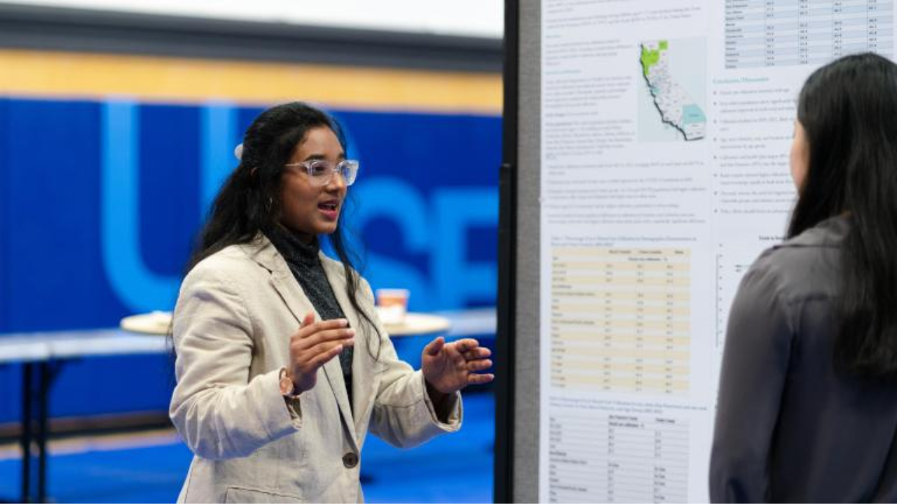 A student presents research at the UCSF School of Dentistry RCED event