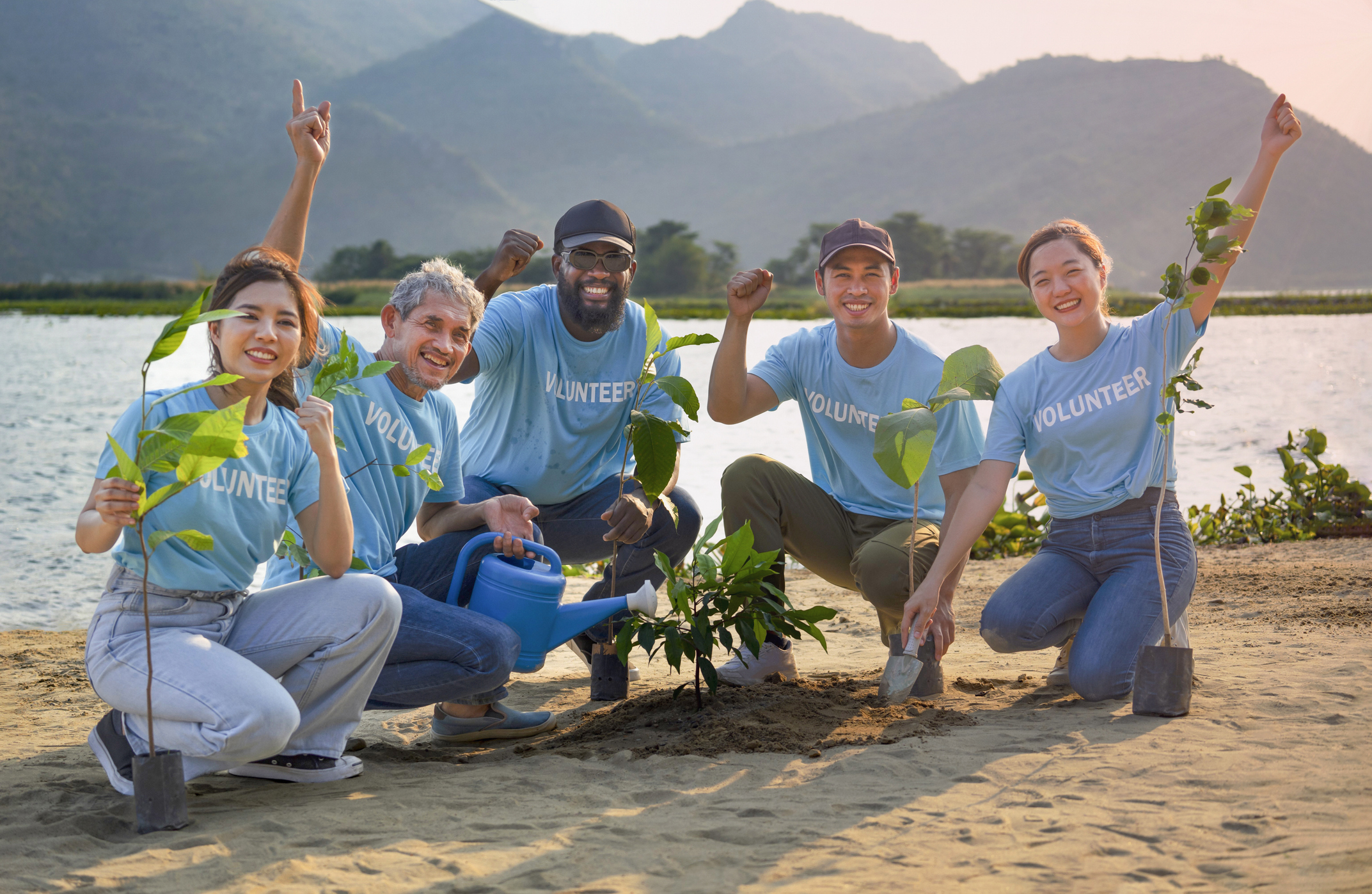 A team of people planting trees together