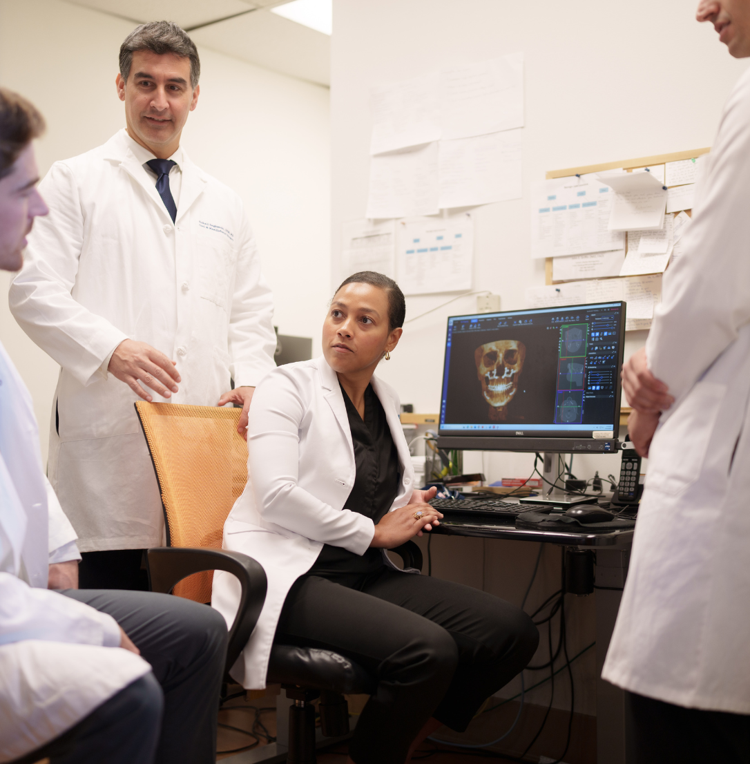 Sohail Saghezchi, DDS, MD and three OMFS residents
