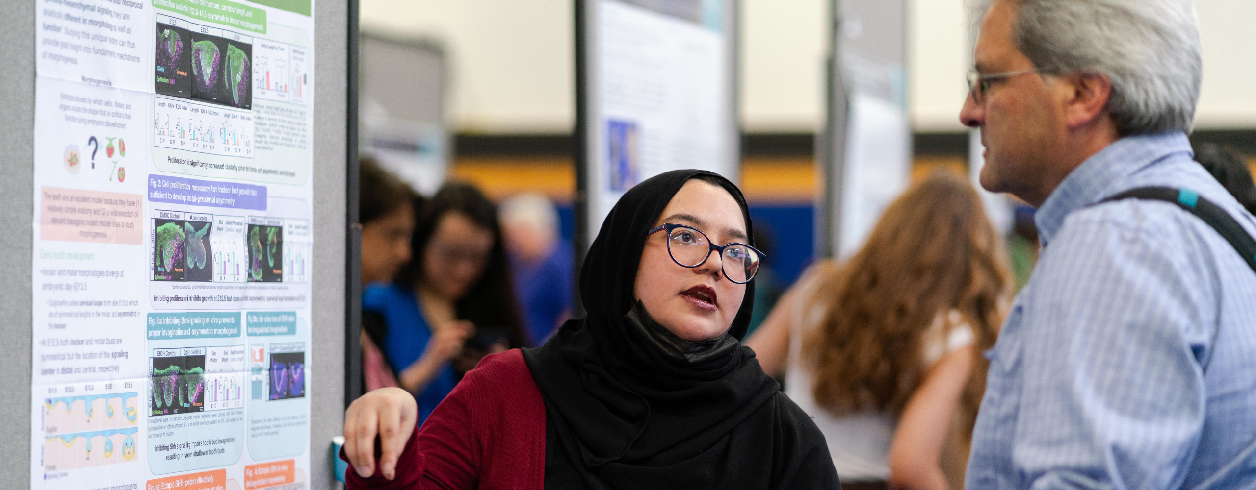 UCSF student researcher presenting at the School of Dentistry annual Research and Clinical Excellence Day