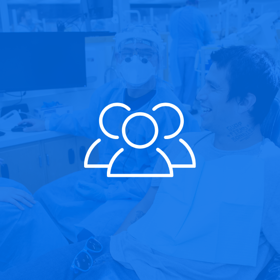 a community icon over a photo of a dental provider with a patient
