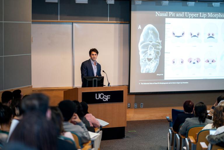 Luke Lucido, DDS/PhD trainee presenting his research on the molecular basis of nasal pit morphogenesis and its role in upper lip formation