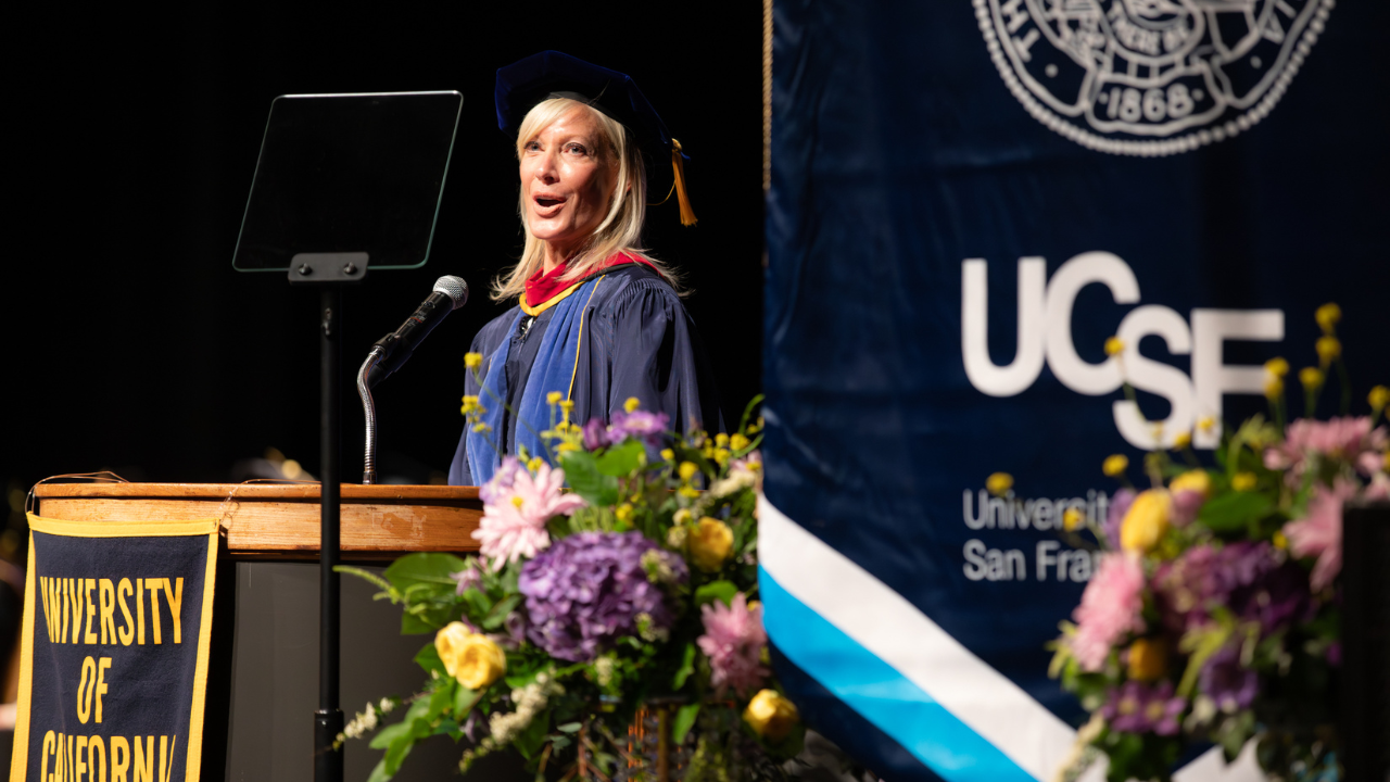 Janet Reilly at the podium delivering the keynote address