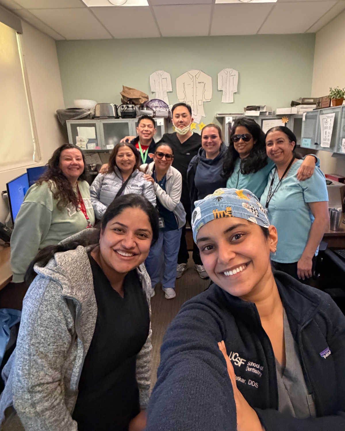 Abha Patkar poses with colleagues and mentors at the clinic