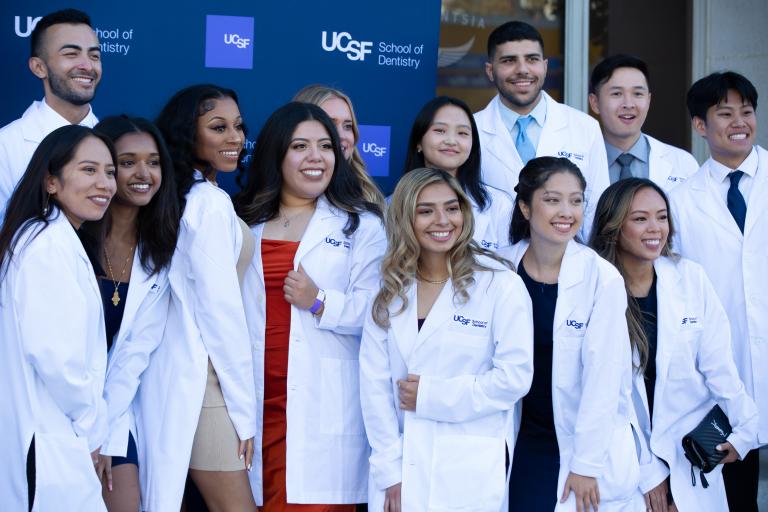 Students taking photos outside Herbst Theatre