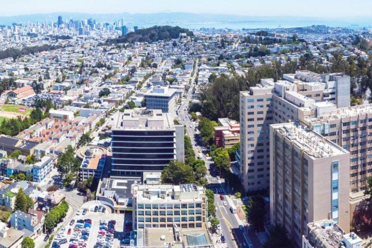 Aerial vew of Parnassus campus with San Francisco and the SF Bay in beyond.