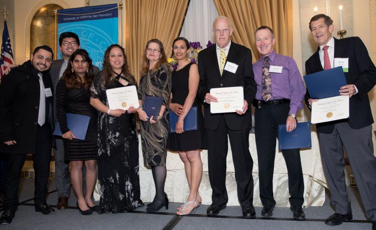 Graduating class presidents and awardees: (left) Bishoy Besada, Joseph Kwan-Ho Yun, Priyanka Saxena, Rebekah Kastner, Karen Maalona, Dr. Sophia Saeed, Dr. Richard Mogensen, Dr. James Giblin, Dr. Barry Burstein