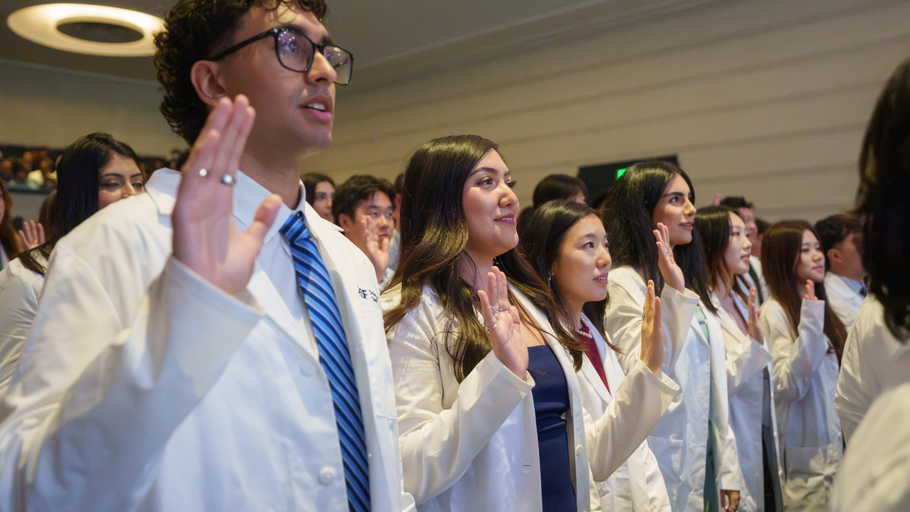 Students recite the Clinic Inducation Pledge