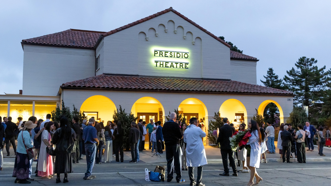 Students gather with their families after the UCSF School of Dentistry White Coat Ceremony