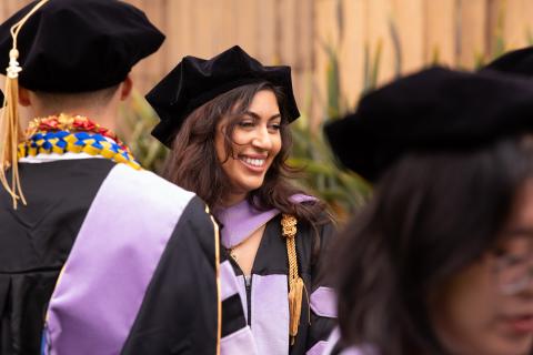 Dentistry graduate smiling with peers