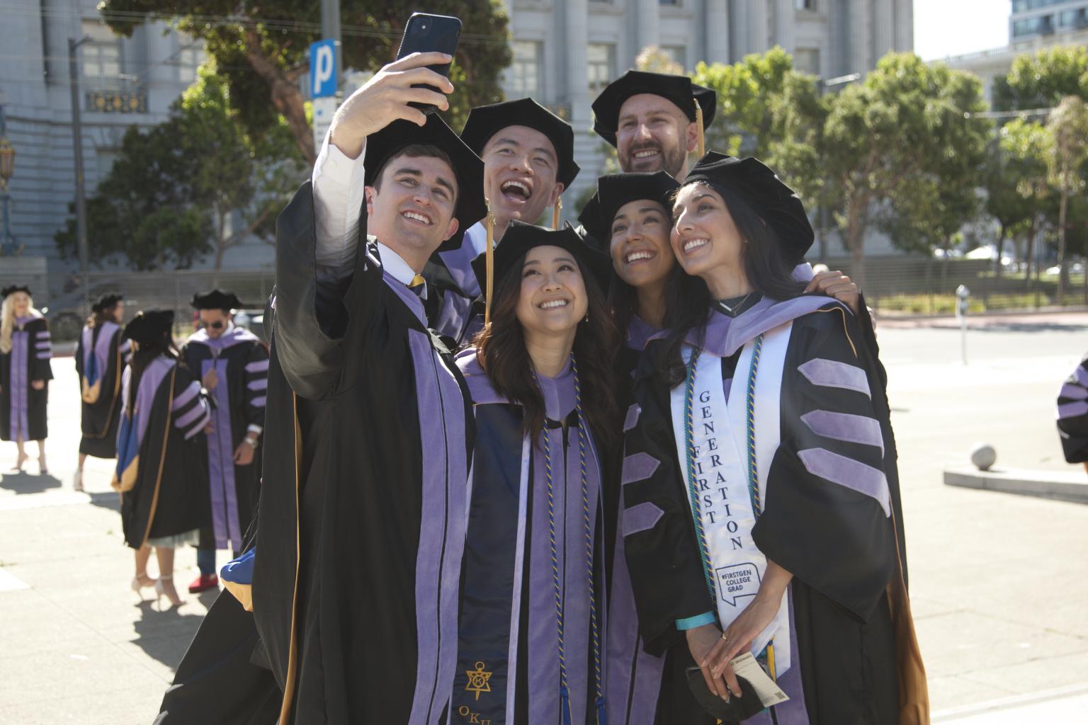 Graduates posing before UCSF Dentistry commencement on June 6, 2022.