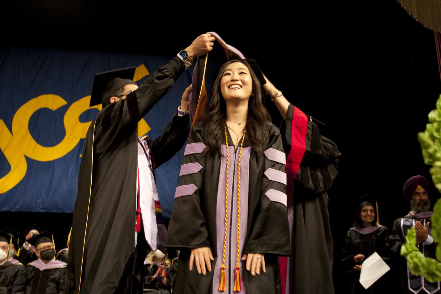 Graduate is hooded at UCSF Dentistry commencement on June 6, 2022