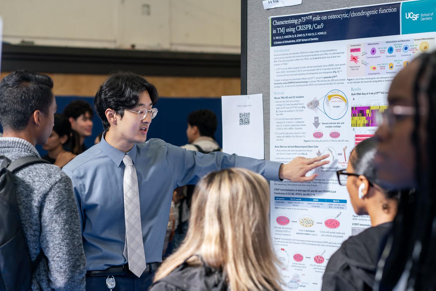 People’s Choice Award winner Eric Yin at poster session with his project "Characterizing p75NTR role on osteocytic/chondrogenic function in TMJ using CRISPR-Cas9"
