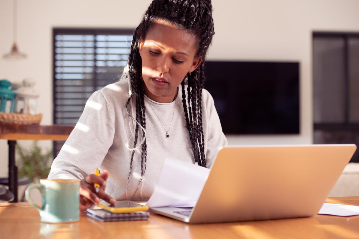 stock photo of a student working on the computer.