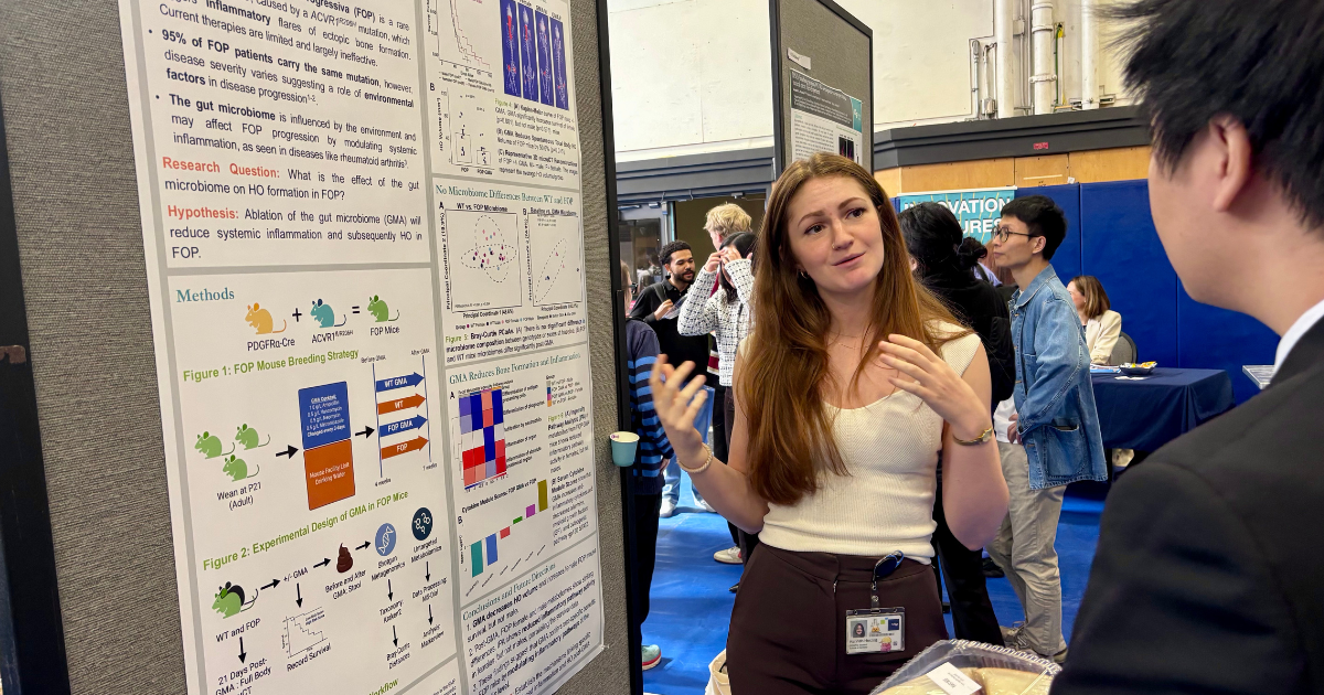 Student researcher presents during RCED 2025